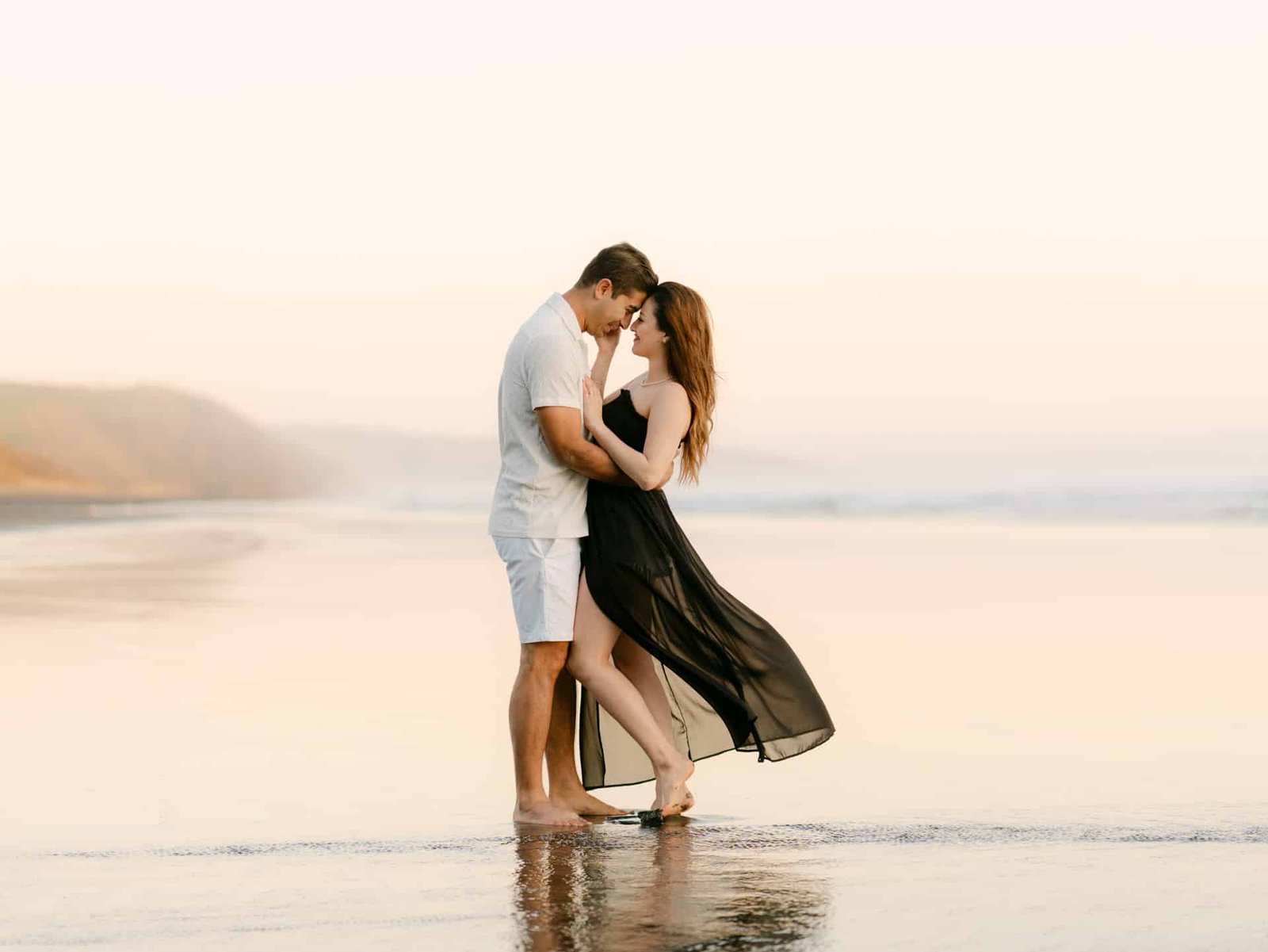 Aida and Nima's sunset couple shoot on the beach at Ruapuke